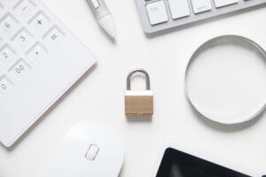 Padlock with business objects. Internet and technology security